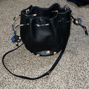 Coach black and floral small bucket purse
